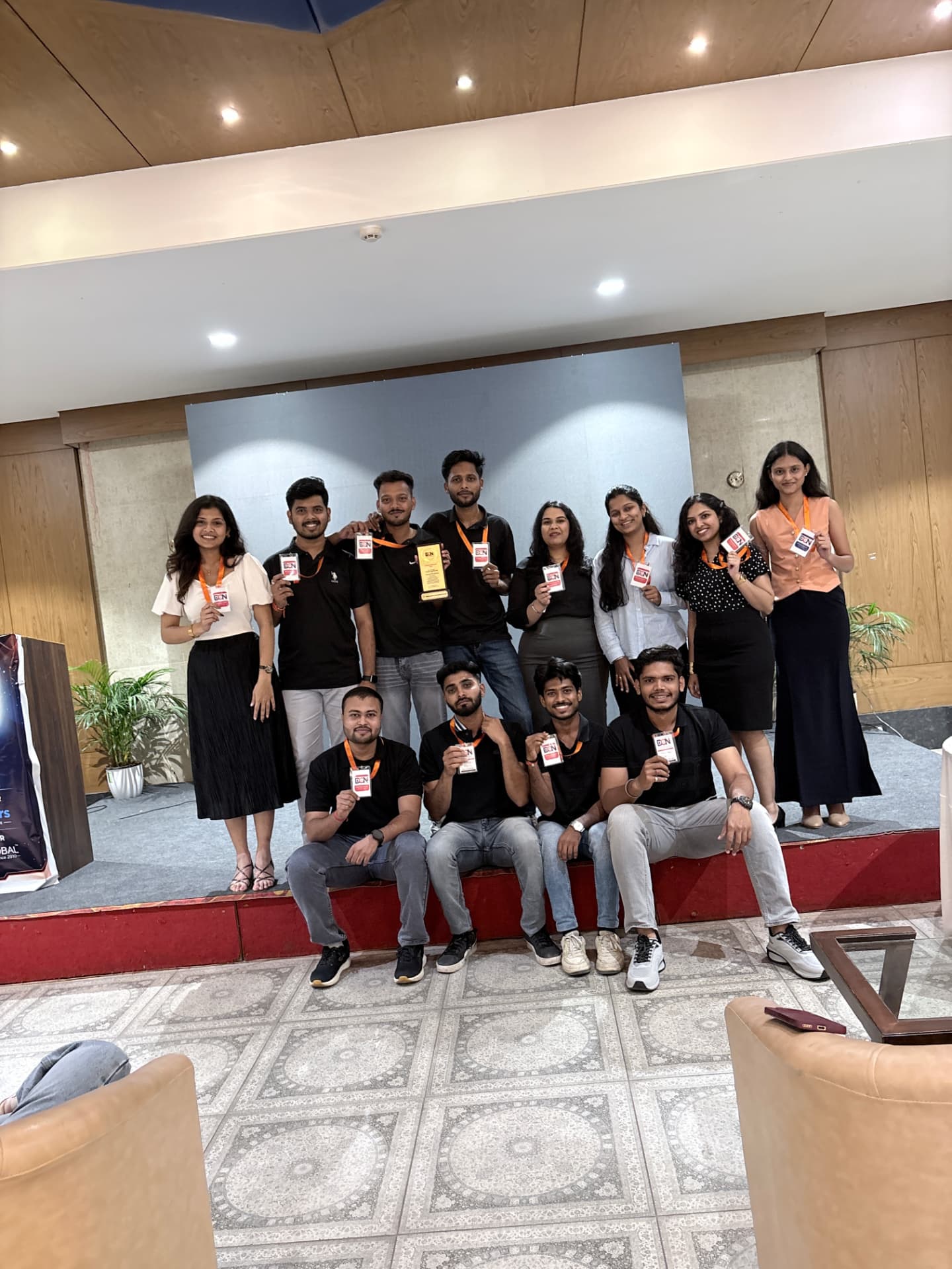 CodeRun winners celebrating with certificates and trophy